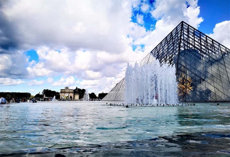Paris: private city tour with seine river cruise - Louvre area highlights: pyramid, courtyards, and the iconic skyline