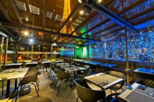Seine River Sightseeing Cruise and Dinner at Le Bistro Parisien - The 1-hour Seine cruise: sights, bridges, and guided narration
